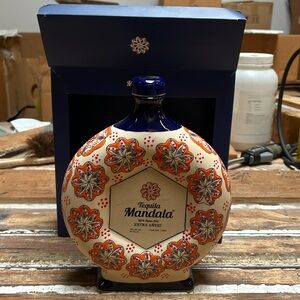 Empty bottle of Mandala Extra Anejo